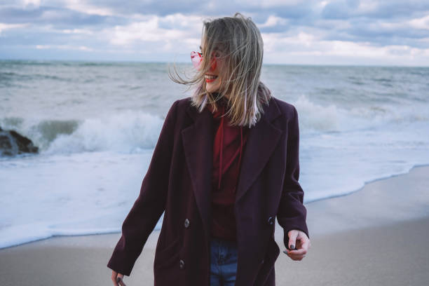 Girl on the winter seashore