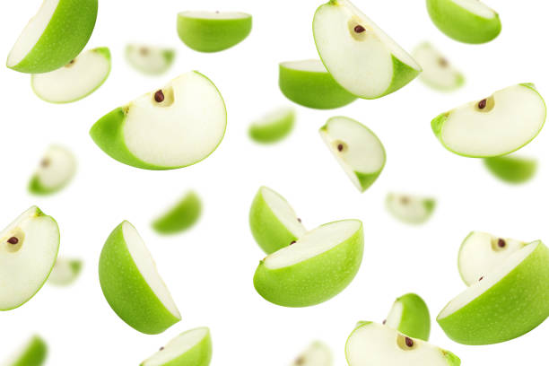 istock Falling green juicy apple isolated on white background, selective focus 1194662663