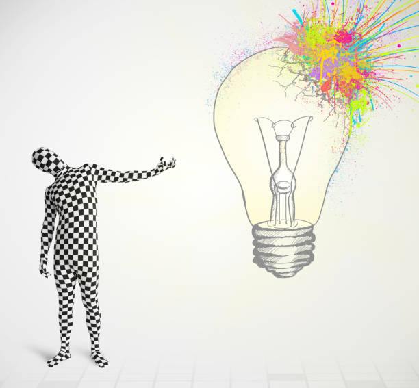 istock 3d human character is body suit looking at abstract colorful lightbulb 1194662900
