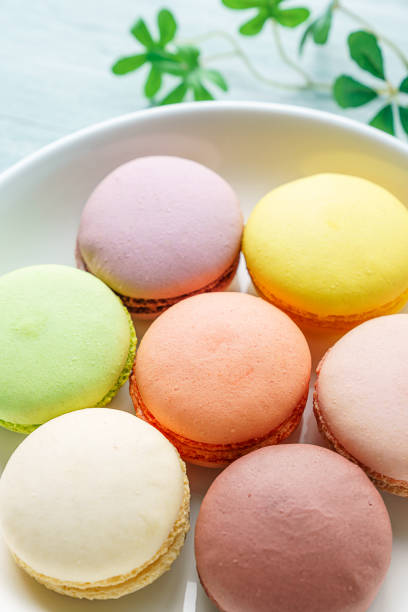 istock Sweet colorful macaroons on wooden background 1194664151