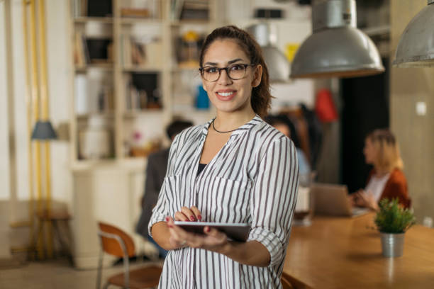 istock Female professional in start-up office 1194665597