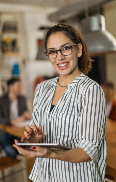 istock Young college girl in modern classroom 1194665634