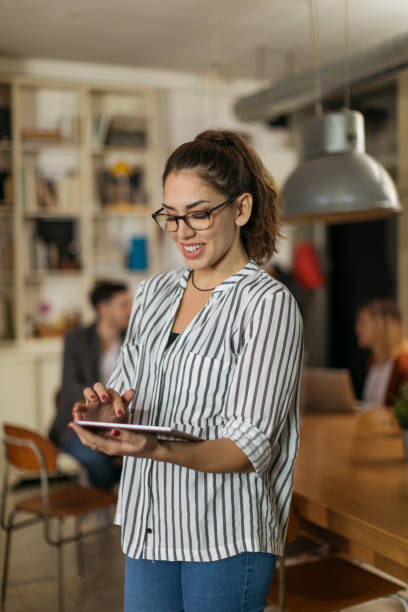 istock Young college girl in modern classroom 1194665639
