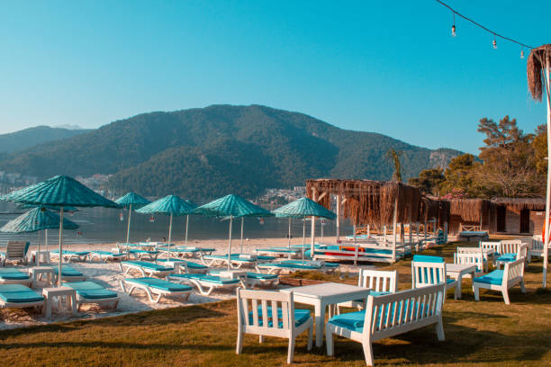 istock Turquoise sun loungers 1194665787