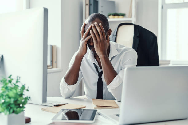 istock Frustrated young African man in formalwear 1194667636