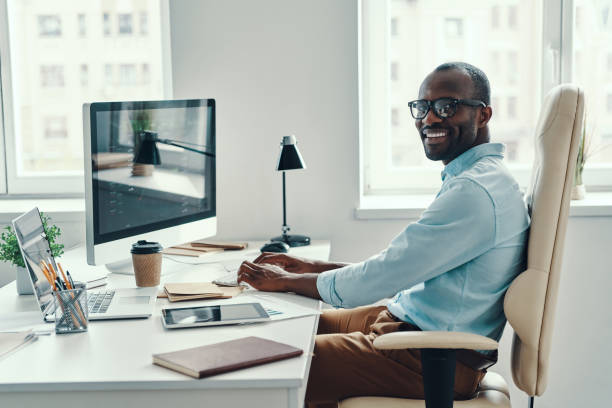 istock Happy young African man in shirt 1194668094