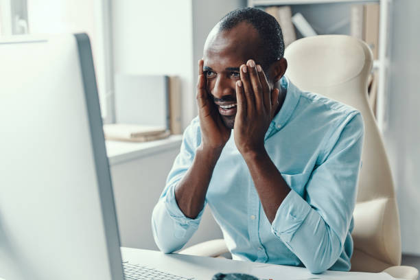 istock Handsome young African man in shirt 1194669284
