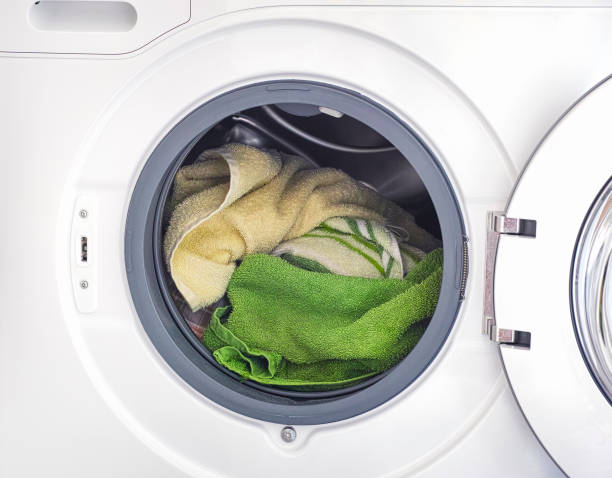 istock Towels inside the washing machine 1194672315