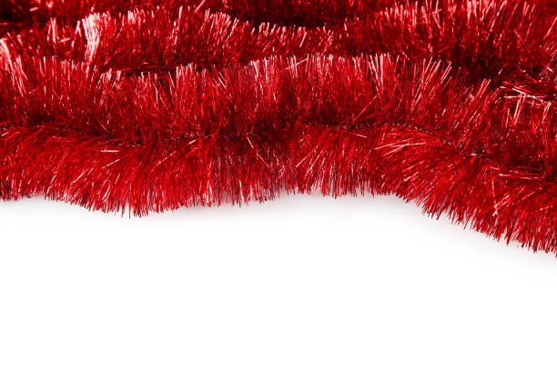 istock Christmas tinsel on white background 1194672582