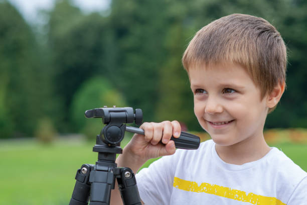 istock Boy singing into a fake microphone 1194672917