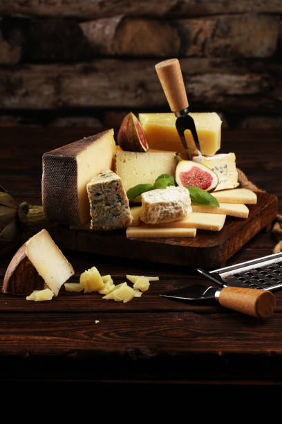 istock Different sorts of cheese. Cheese platter with different cheese and spice 1194673689