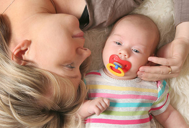 mother and her little baby stock photo