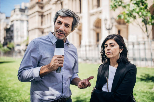 istock News reporter in live broadcasting 1194673878