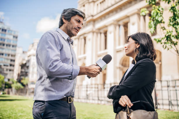istock News reporter in live broadcasting 1194673922