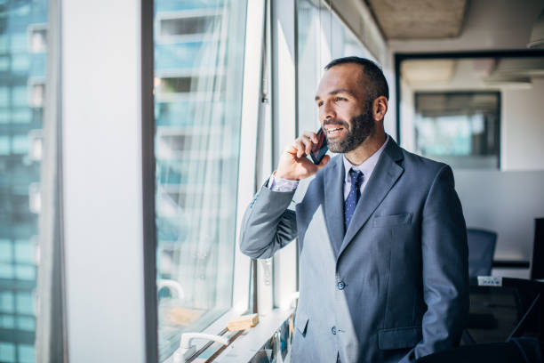 istock Businessman talking on the phone 1194674029