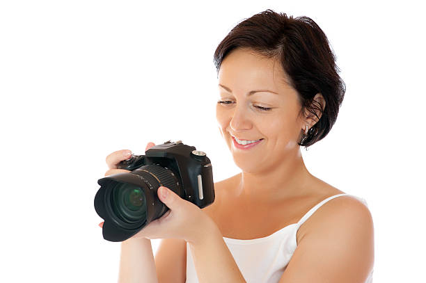 istock Young woman with DSLR 119467540