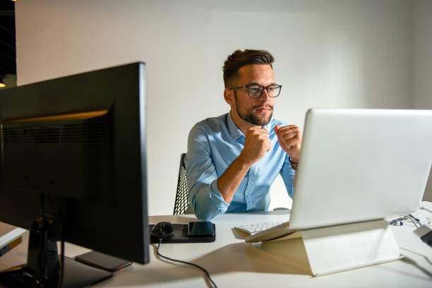 istock Young man sitting in his office 1194676669