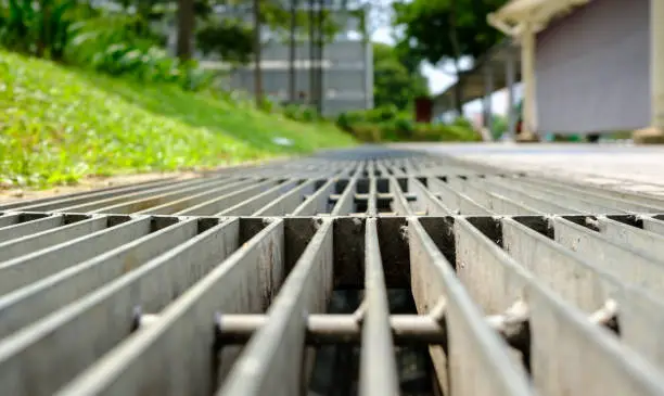 Photo of close up view of a sidewalk drainage gate