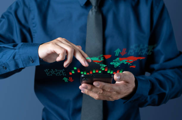 istock Businessman check candlestick chart from world stock market 1194677183