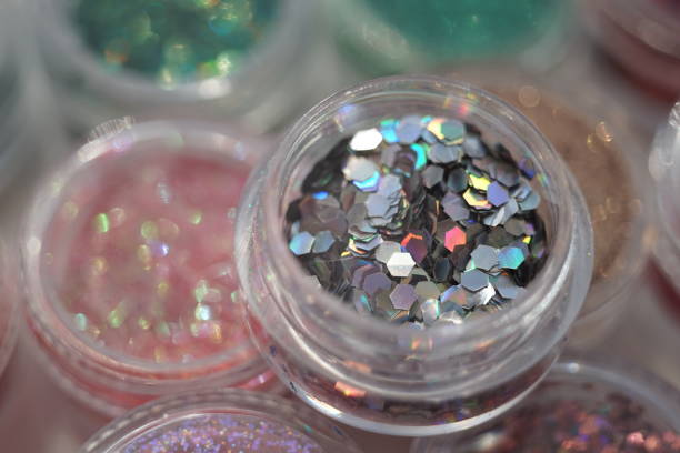 istock Set of different sequins in plastic packaging, materials for nail design. 1194677279