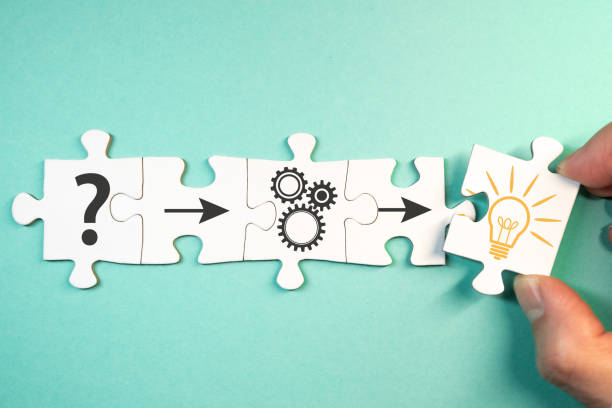 finding solution for a problem concept with jigsaw puzzle pieces finding solution for a problem, analysis concept with top view of jigsaw puzzle pieces learning objectives stock pictures, royalty-free photos & images