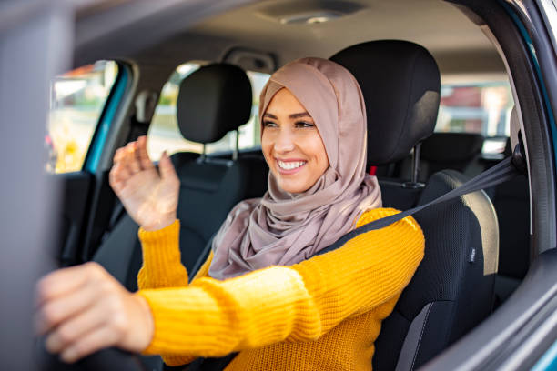 istock Arab women driving car. 1194678136