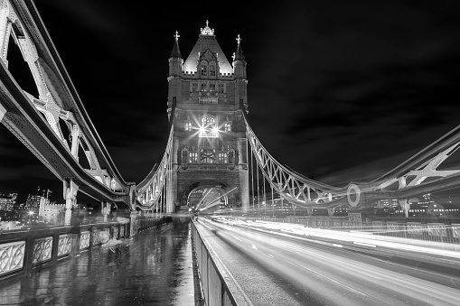 Light trail created by the busy traffic on Tower Bridge, London.