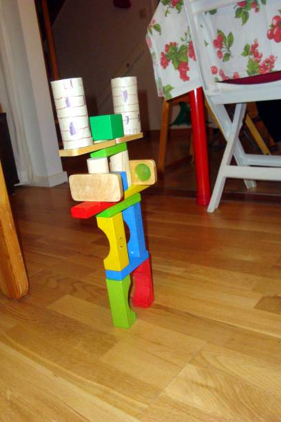 istock an abstract structure made with plastic and wooden toys 1194684313