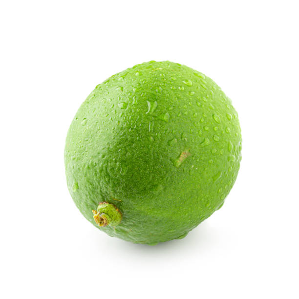 istock Fresh green lime isolated on white background 1194687136