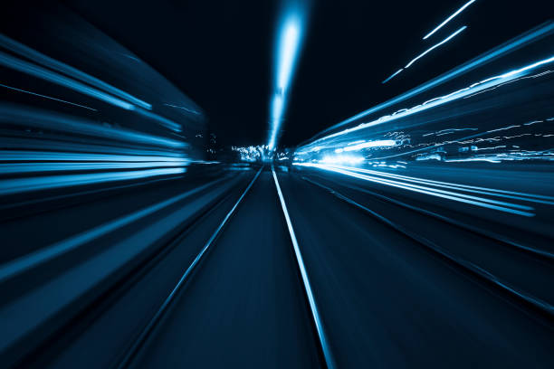istock Abstract long exposure and blurred city lights 1194687307