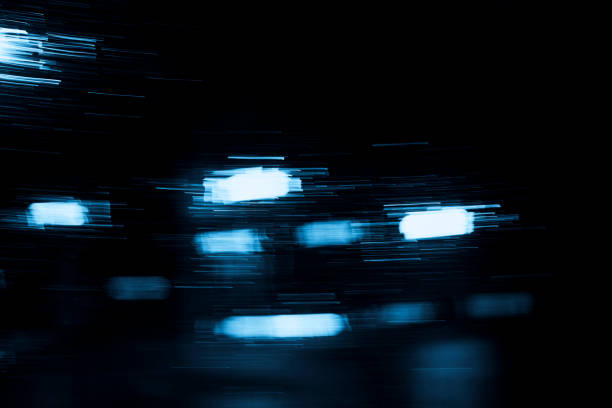istock Abstract raindrops on window and blurred city lights 1194687680