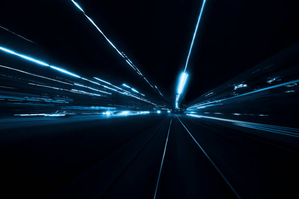 istock Abstract long exposure and blurred city lights 1194690020
