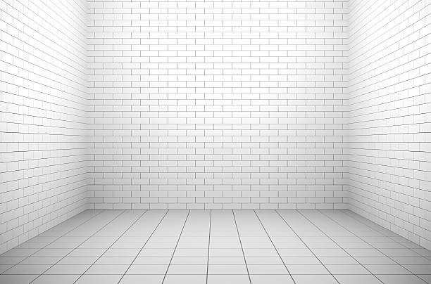 istock A white brick room with white tiles on the floor 119469080