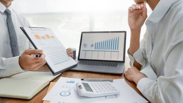 istock Midsection Of Business People Working In Office 1194693792