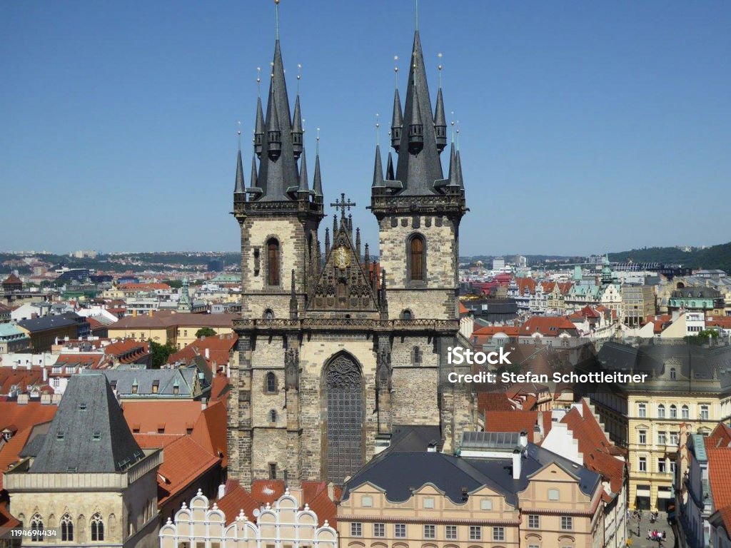 the city of prague with the church the city of prague with the church at summer Architecture Stock Photo