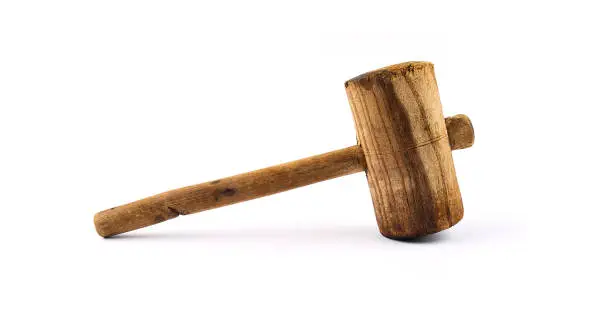 Photo of Old Wooden Mallet On White background