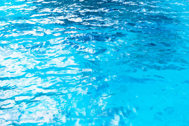 istock Clear shiny blue ocean water surface. Natural background 1194696621