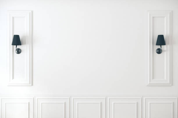 istock White classic wall with lamps 1194696863