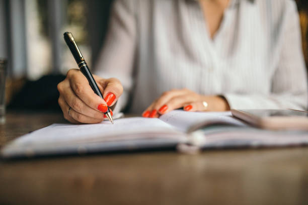 istock Woman taking minutes 1194697054