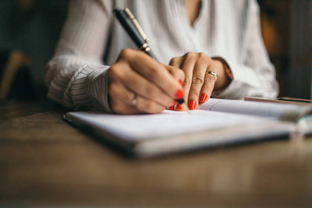 istock Woman taking minutes 1194697224