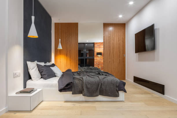 istock Elegant bedroom with tv 1194698339