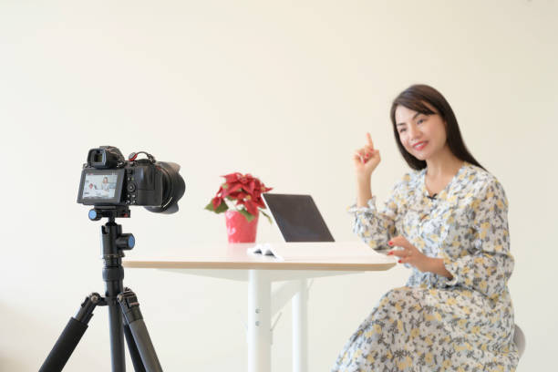 istock Social media woman talking with camera 1194698541
