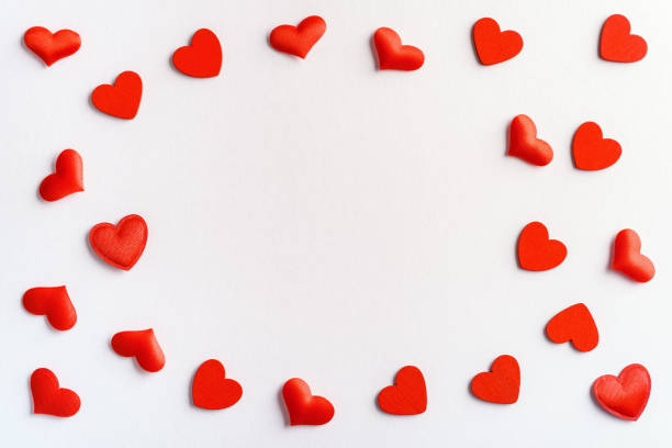 istock Festive composition from red hearts scattered on white background, valentines day concept, copy space for text 1194702085