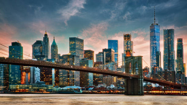 istock Manhattan Financial District. Brooklyn Bridge. New York. Sunset. 1194703051