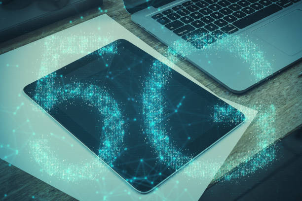 istock Closeup of tablet with 5G hologram 1194704574