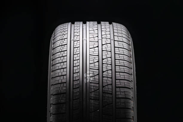 istock new black all-season premium tire. protector close-up. front view. 1194705048