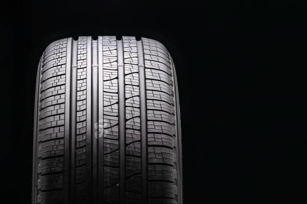 istock new black all-season premium tire. protector close-up. front view. copyspace 1194705080
