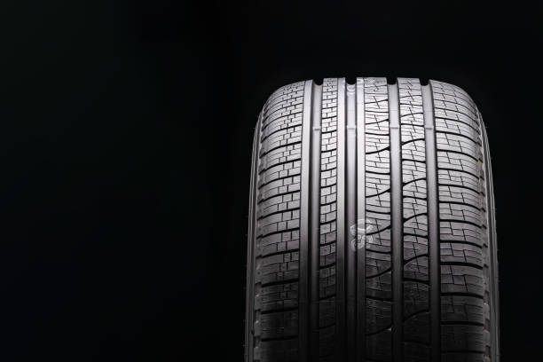 istock new black all-season premium tire. protector close-up. front view. copyspace 1194705103