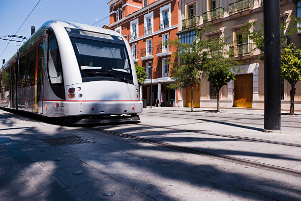 современный трамвай в севилье - train spain seville europe стоковые фото и изображения