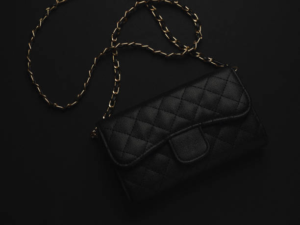 istock Black leather bag with golden chain 1194705928